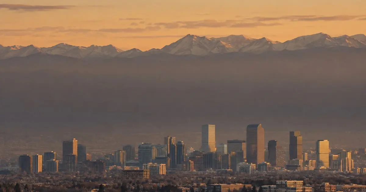 Denver skyline illustrating the risk of changing jobs before closing